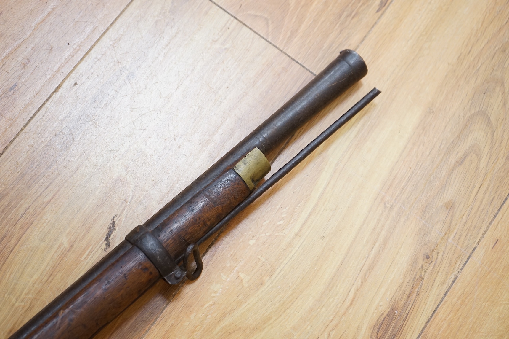 An Indian military style percussion musket, fully stocked, barrel 115cm, with military style brass mounts, iron barrel bands and Enfield style lock, partly 19th century